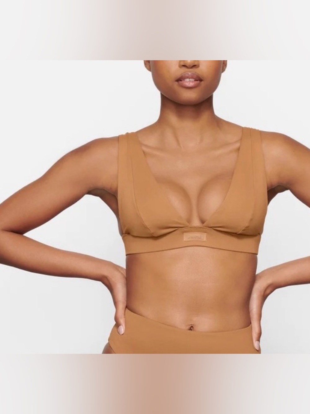 SKIMS plunge bikini top in almond size XS brand new with tags.